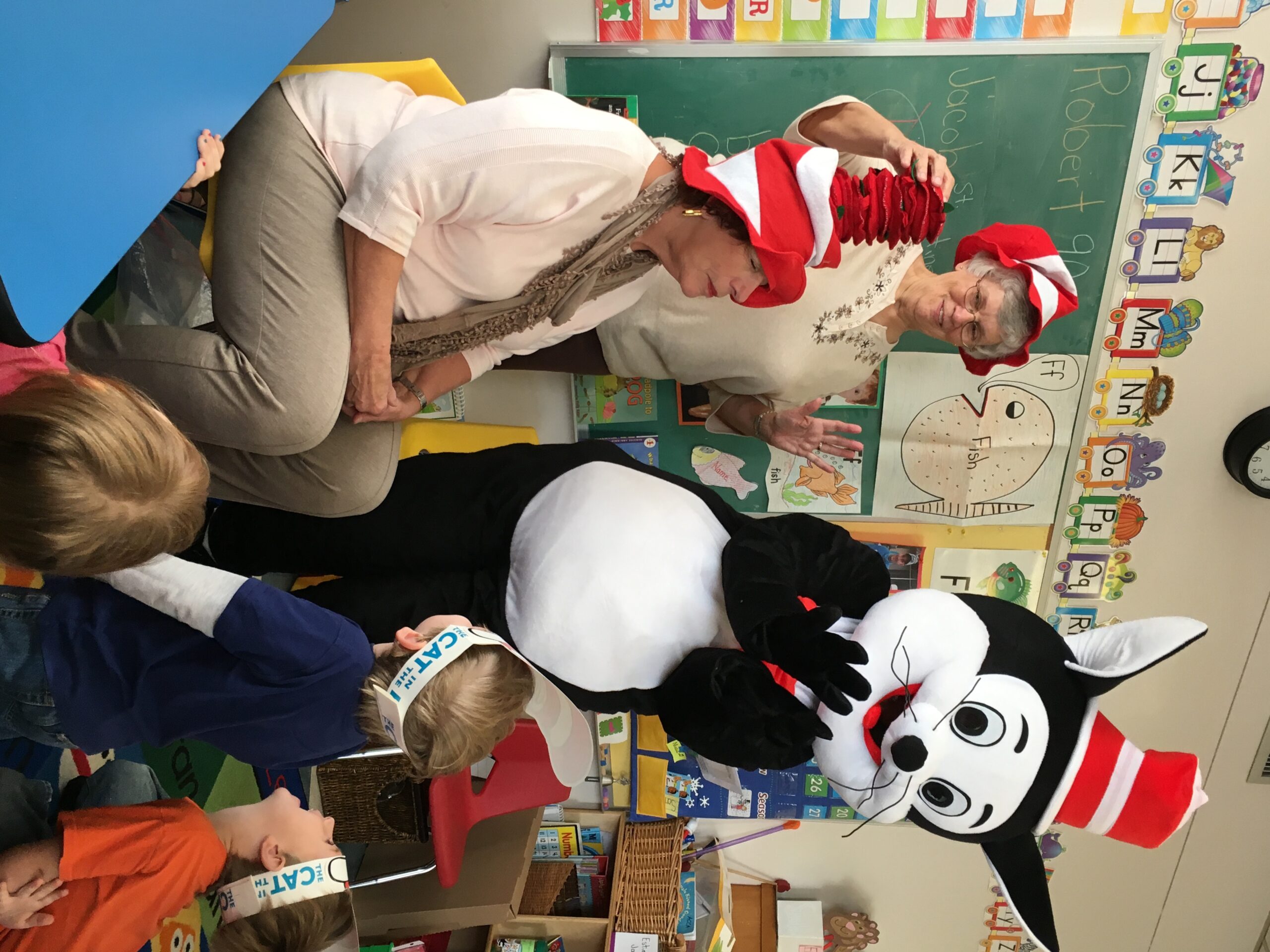 Dr. Seuss' Cat in the Hat Reads to Children in local childcare center.