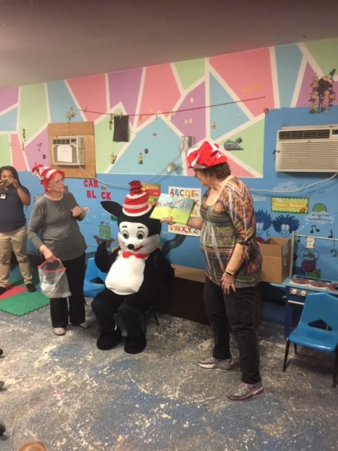 ELC of North Florida volunteers Sally Leitzman and Sara Pines read with special guest “The Cat in the Hat” to children at The Children’s Academy of Interlachen.